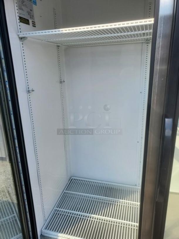True GDM-72-HC-TSL01 glass door merchandiser, 78", three sections, shelves visible, excellent condition.