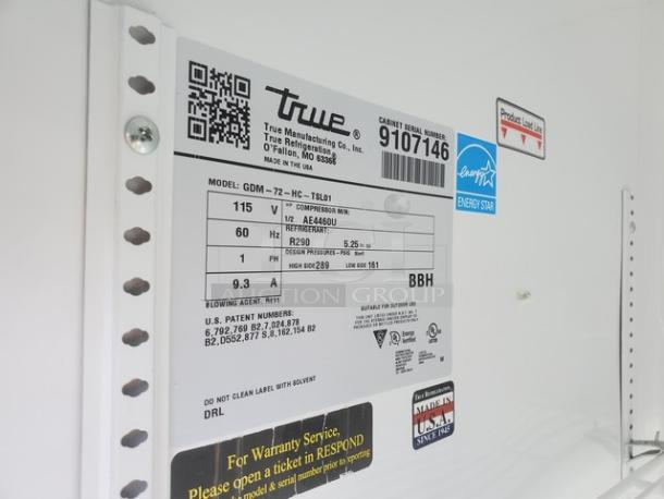 True GDM-72-HC-TSL01 glass door merchandiser interior label. Displays model, voltage, and Energy Star rating.