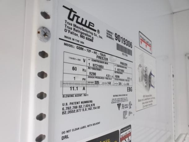 True GDM-72F-HC-TSL01 freezer, model label displaying specs: R290 refrigerant, 60 Hz, 11.1 A, made in USA.