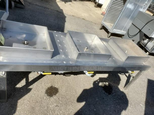 Stainless steel food warmer with three compartments and lids, designed for commercial use. Good condition.