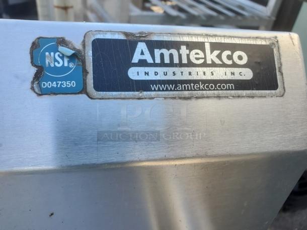 Amtekco 3-compartment stainless steel sink, features NSF certification, showing brand label, minor surface wear.