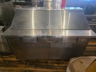True QA-60-24M-B 60" refrigerated prep table, stainless steel, 115V, 60 Hz, 1 PH, dual compartments, good condition.