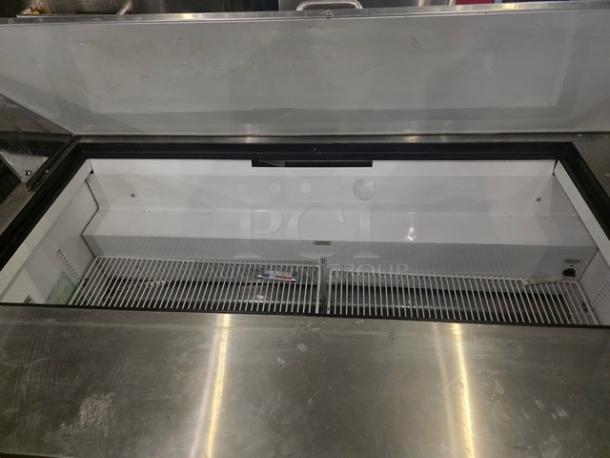 True QA-60-24M-B 60" refrigerated prep table, stainless steel surface, spacious interior, excellent condition, 115V, 60 Hz, 1 PH.