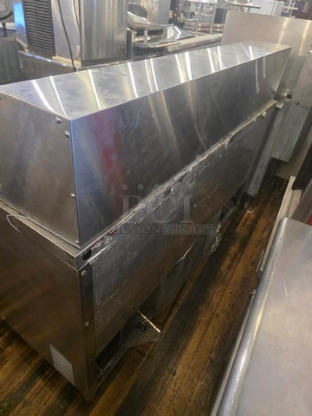 True QA-60-24M-B 60" refrigerated prep table, stainless steel, with visible wear. Model label indicates 115V, 60 Hz, 1 PH.