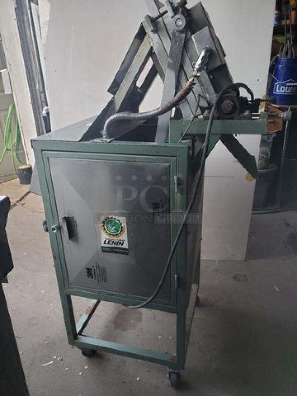 ECO Lenin Cam Press Tortilla Machine, 208-220V, Single Phase, by ECO-HC LENIN. Features sturdy build, visible logo, and attached cables.