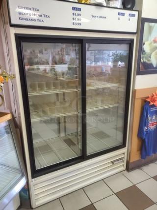 Beverage Air MT45 glass slide door beverage cooler, two-door, pre-owned, includes pricing labels on top, good condition.