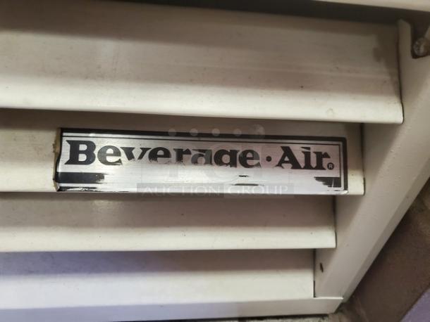 Beverage Air MT45 cooler with sliding glass doors, visible brand logo on vent, used condition.