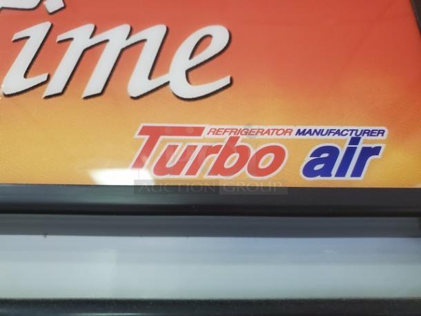 Turbo Air TGM-22CR logo and label detail on a commercial glass door cooler merchandiser.