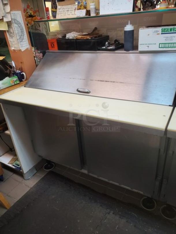 Beverage Air SUR48-18M 48" sandwich prep table, two-door, stainless steel, no contents included.