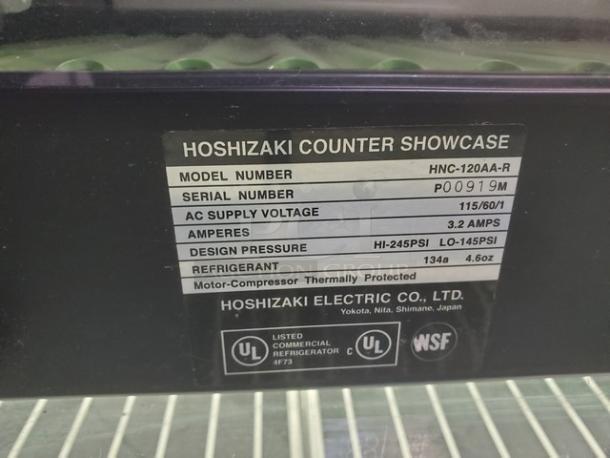 Hoshizaki HNC-120AA-R sushi display case, model number HNC-120AA-R, serial P00919M, 115/60/1 voltage, 3.2 amps.