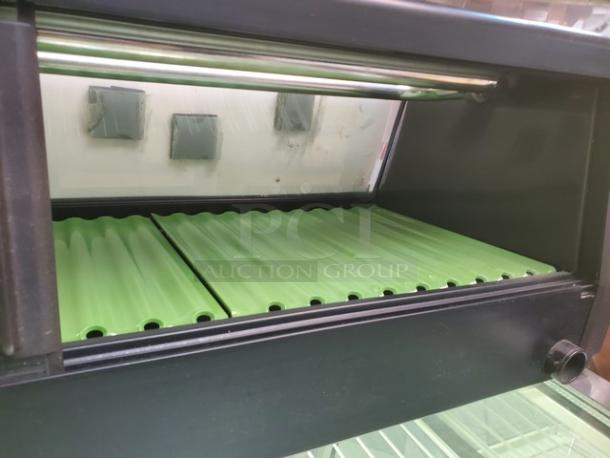 Hoshizaki HNC-120AA-R refrigerated sushi display case with green interior shelf. Clean, excellent condition.