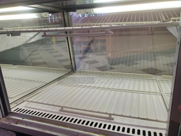 Federal Industries 5942SC-2, 59" flat glass refrigerated bakery display case, double shelves, clean condition.