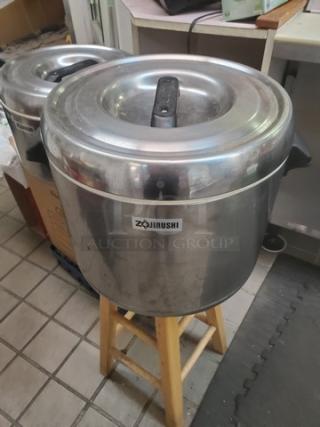 Lot of 2 Zojirushi 25-cup stainless steel thermal rice holders. Non-electric, insulated, with handles. Good condition.