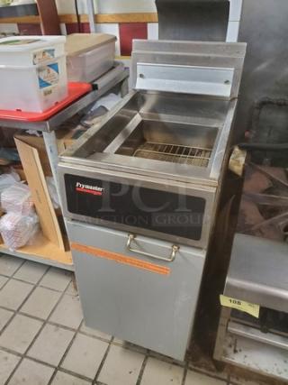 Frymaster GF14SP gas fryer, 40 lb. capacity, stainless steel, used condition. Features front control panel and safety label.
