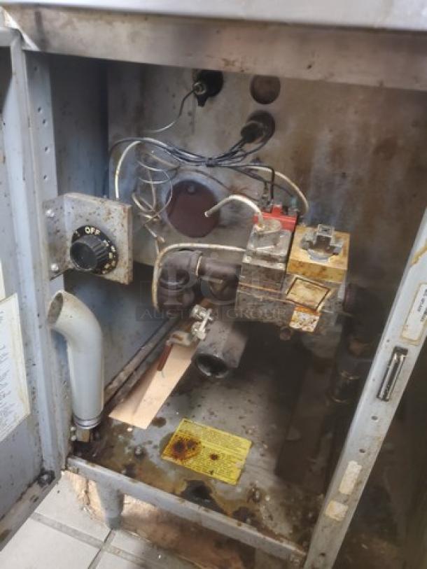 Frymaster GF14SP gas fryer, 40 lb. capacity, showing internal components. Used condition with visible wear and rust.