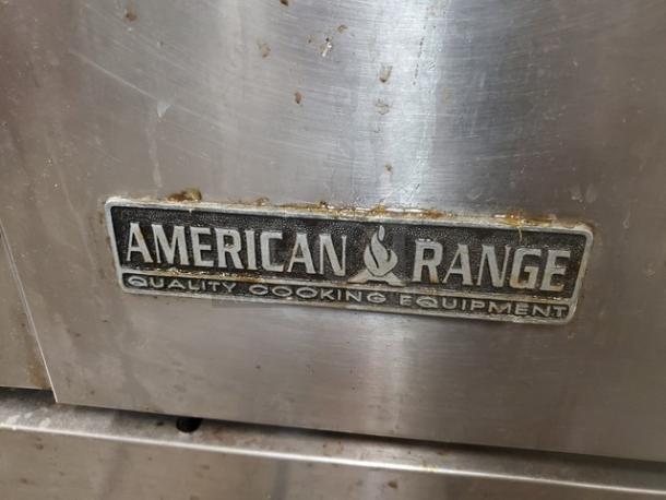 American Range 6 Burner Natural Gas Range, stainless steel, visible wear. Label reads: "American Range, Quality Cooking Equipment."