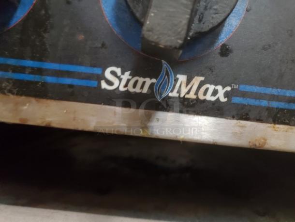 Star-Max Countertop Gas Stock Pot Range, visible logo. Features durable construction, used condition. Suitable for commercial kitchens.