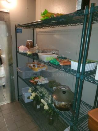 4-tier wire shelving unit, metal, in used condition, with no contents included, ideal for storage organization.