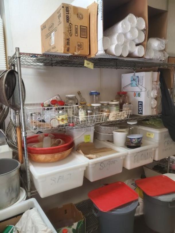 4-tier wire shelving unit, metal construction, adjustable shelves, used condition. Contents not included.