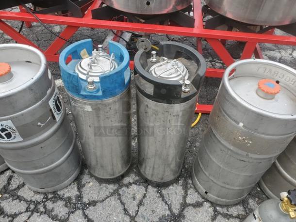 The Alpha Ruby 1 Barrel Brew System, gas/propane compatible, includes 8 kegs. Used condition, pick up only.