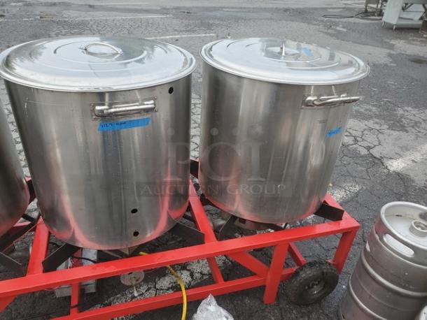 The Alpha Ruby 1 Barrel Brew System on red frame with stainless steel kegs; gas/propane compatible. Includes 8 kegs.