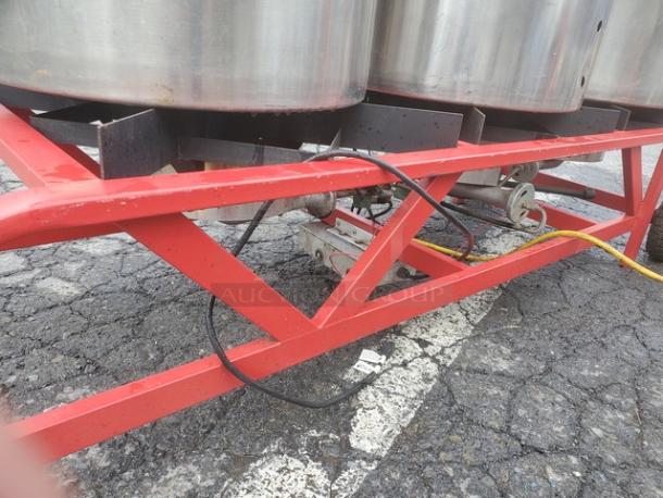 The Alpha Ruby 1 Barrel Brew System, gas/propane compatible, red frame, includes 8 kegs, pick up only.