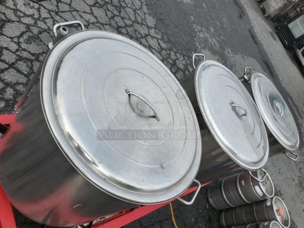 The Alpha Ruby 1 Barrel Brew System with three stainless steel pots, gas/propane compatible, includes 8 kegs. Pick up only.