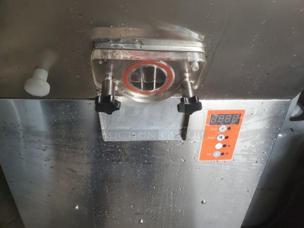 Kolice ICM 200P ice cream machine, stainless steel, digital control panel, dual dispensing nozzles, in good condition.