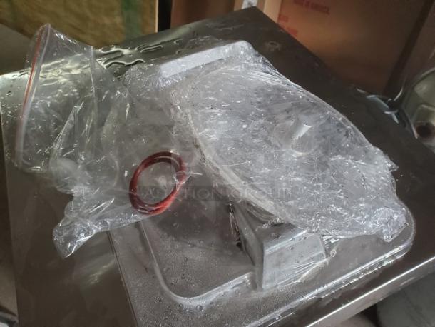 Kolice ICM 200P ice cream machine, wrapped in plastic, featuring metal construction.
