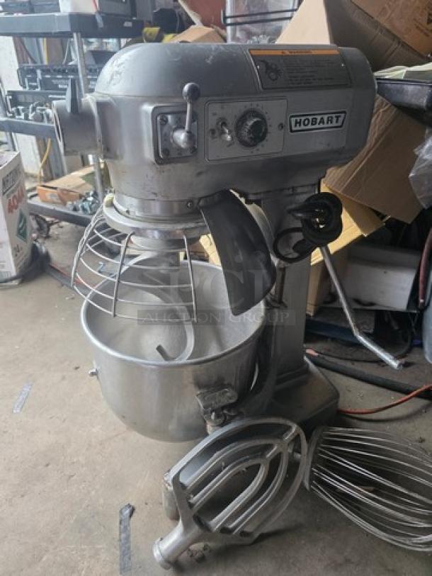 Hobart A200 20 Qt commercial dough mixer with attachments. Some grinding in 3rd gear; otherwise in good working condition.