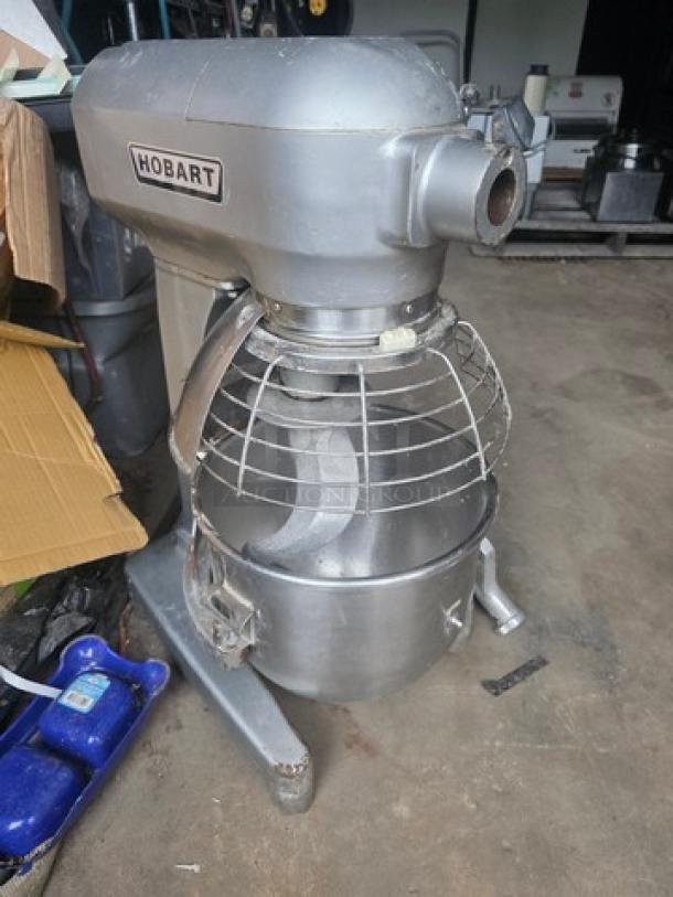 Hobart A200 20 Qt Commercial Dough Mixer with attachments, slight grind in 3rd gear, overall good condition.