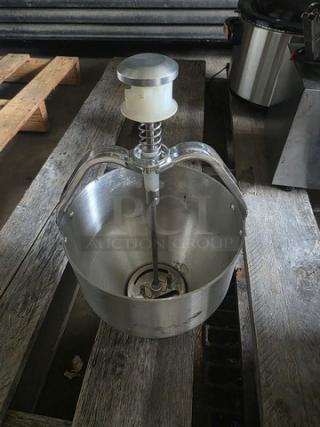 Aluminum pancake dispenser, sturdy design, featuring spring mechanism. Used, with some wear, ideal for bulk batter dispensing.