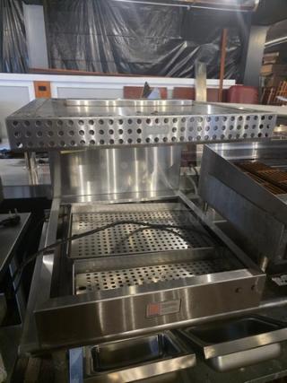 Marshall Air Systems RR5-26-IM fried food dump station with stainless steel body and perforated tray. Excellent condition.