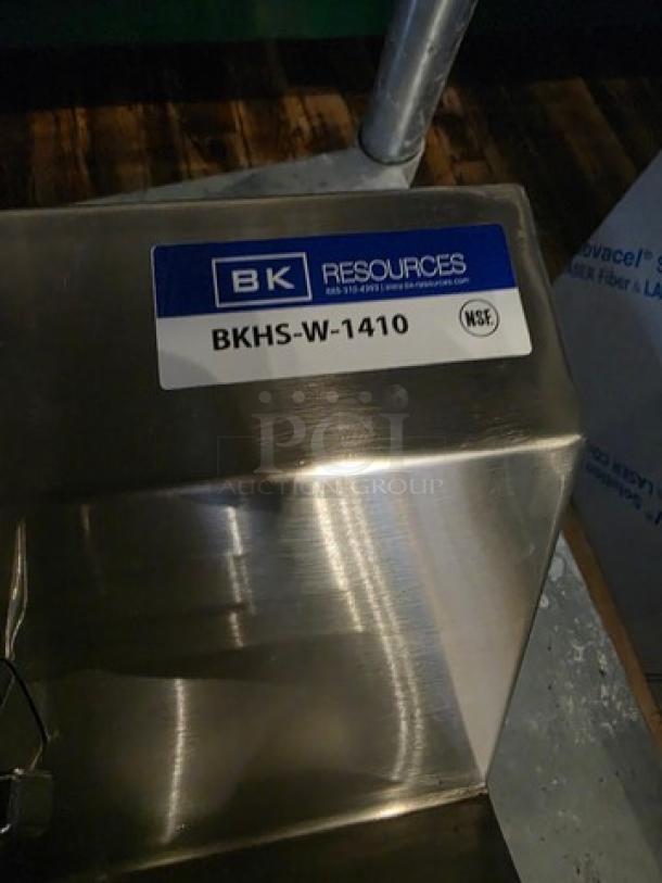 Stainless steel hand sink by BK Resources, model BKHS-W-1410, featuring faucet, 2 holes, 1-7/8" drain, 14"x10"x5".
