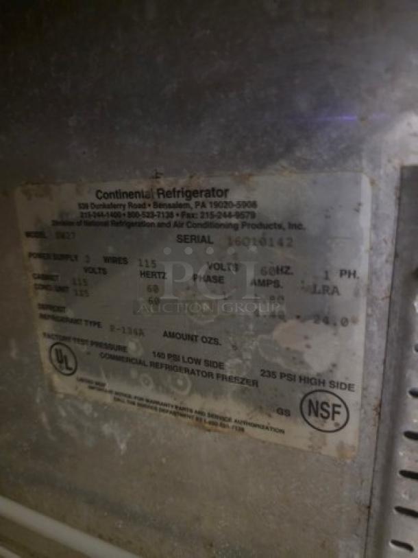 Continental SW27 undercounter refrigerator, commercial-grade, model label visible, NSF certified, used condition.