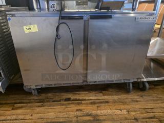 Beverage-Air UCR48A 48" undercounter refrigerator, stainless steel, dual doors, visible wear, label "159", on wheels.