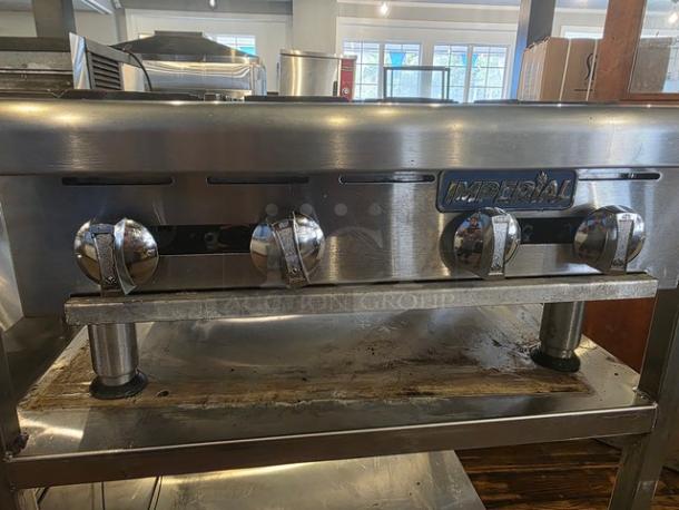 Imperial 4 Burner Countertop Range, natural gas. Stainless steel, used condition. Stand not included.