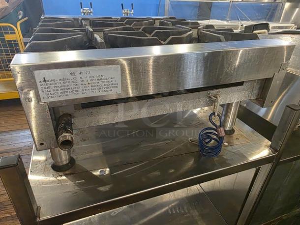 Imperial 4 Burner Countertop Range, natural gas, stainless steel, without stand, visible installation instructions label.