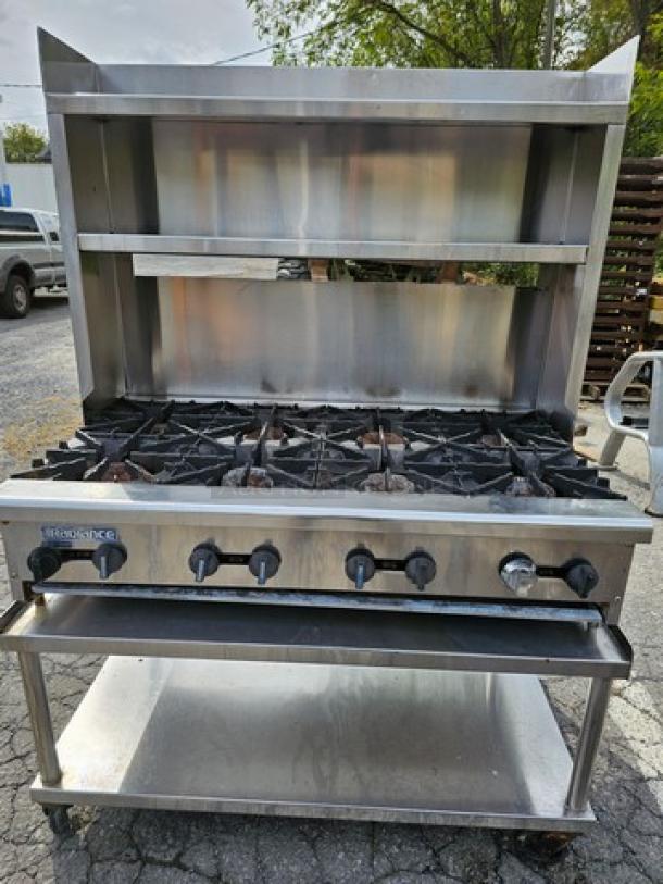 Radiance 48" countertop 8-burner gas commercial hotplate with stand, stainless steel, excellent condition, visible control knobs.