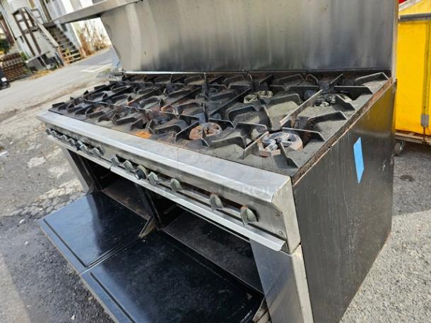 Dynamic Cooking Systems natural gas range, Model 72-12-2, with 12 burners and 2 oven bases. Used condition, visible wear.