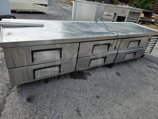 True TRCB-110 six-drawer refrigerated chef base, 110", stainless steel, used condition, visible surface wear.