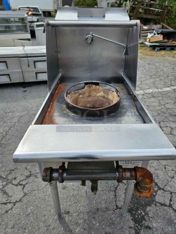 Single Burner Nat Gas Wok Range, stainless steel, used condition with visible rust, suitable for commercial kitchens.