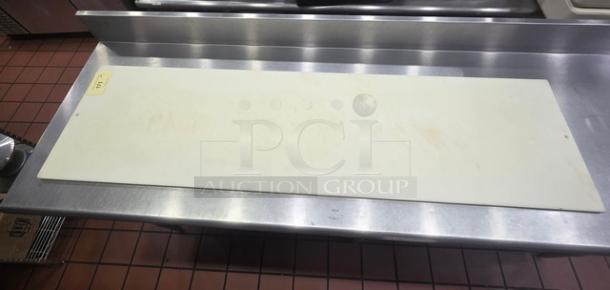 Lot of 3 cutting boards on a metal surface, longest board is 67 inches, used condition with visible wear and a label marked "3xBID."