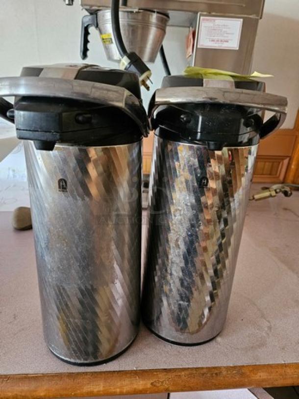 Lot of two Newco Thermal Airpots featuring a diamond pattern. Stainless steel, well-maintained, suitable for hot beverages.
