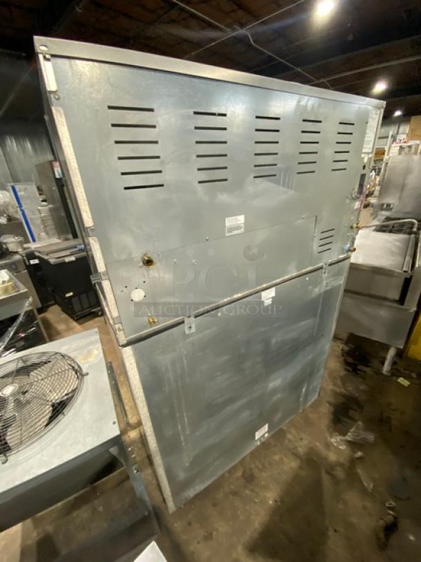 Ice-O-Matic CIM1446HR4/VRC2061B1 stainless steel ice machine head/bin combo with remote condenser on legs, in good condition.