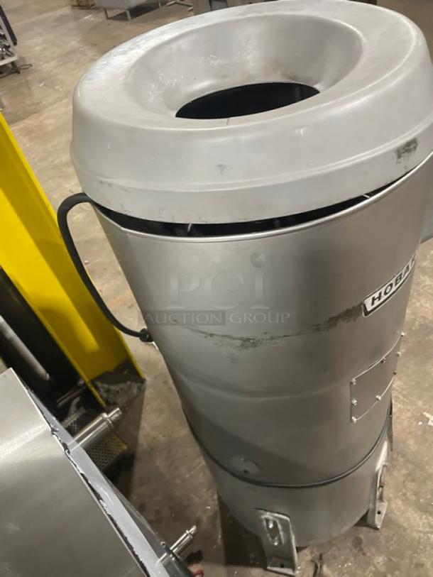 Hobart model 6460C commercial electric potato peeler, heavy-duty, 60 lb capacity, on stand, 115V, 1 phase, silver finish.