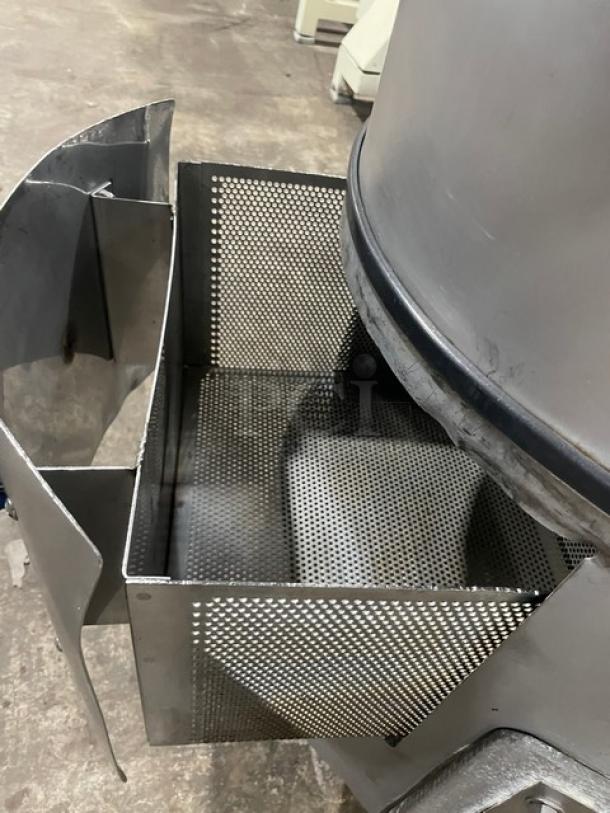 Hobart Model 6460C electric potato peeler, 60 lb capacity, on a stand. Features include perforated peeling chamber and sturdy legs.