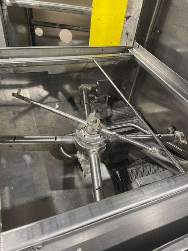 American Dish Service HT25 stainless steel ware washing machine interior, showing spray arms and components. Equipped with Viking Pro IV liquid detergent dispenser/rinse control system.
