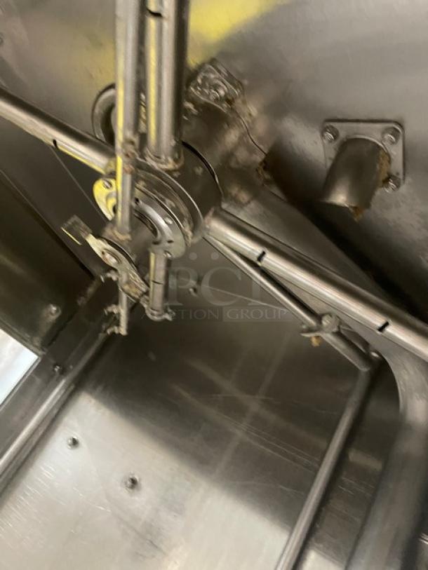 American Dish Service HT25 stainless steel dishwashing machine interior, showing wash arms and metal finish, 208V 3 Phase.