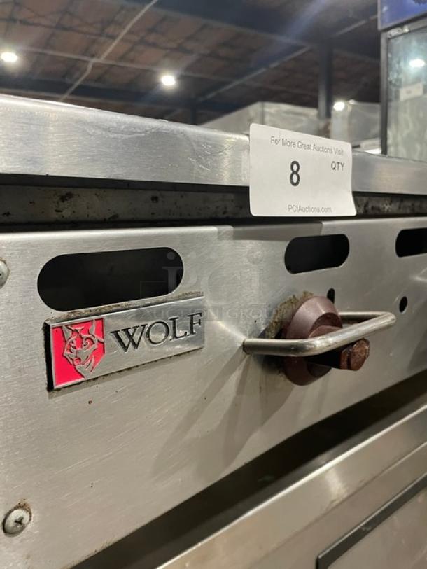 Wolf commercial stainless steel natural gas countertop flat griddle with back & side splash, on legs, working condition.